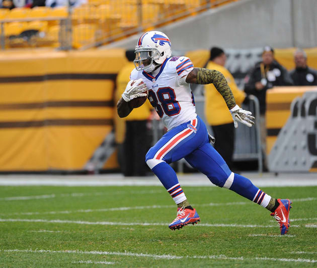 Kick returner Marquise Goodwin runs with the ball during a game against the Pittsburgh Steelers at Heinz Field on November 10, 2013 in Pittsburgh, Pennsylvania.